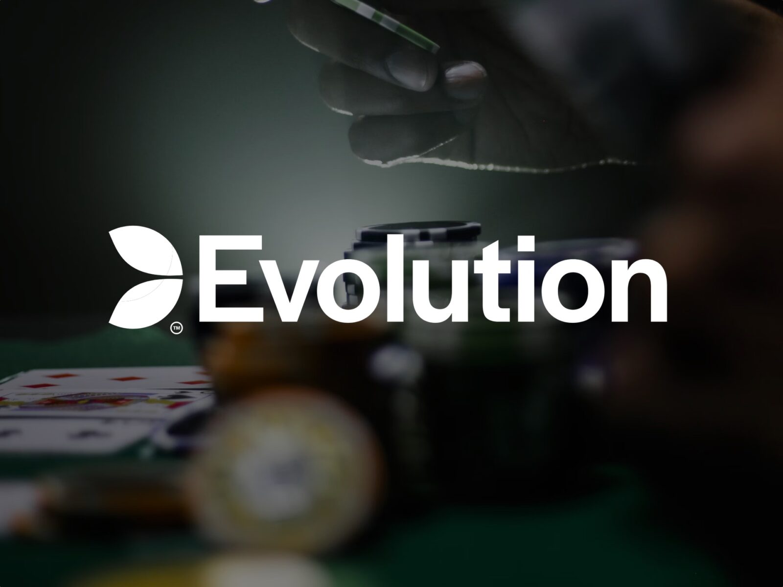 Evolution får sänkta riktkurser efter delårsrapport